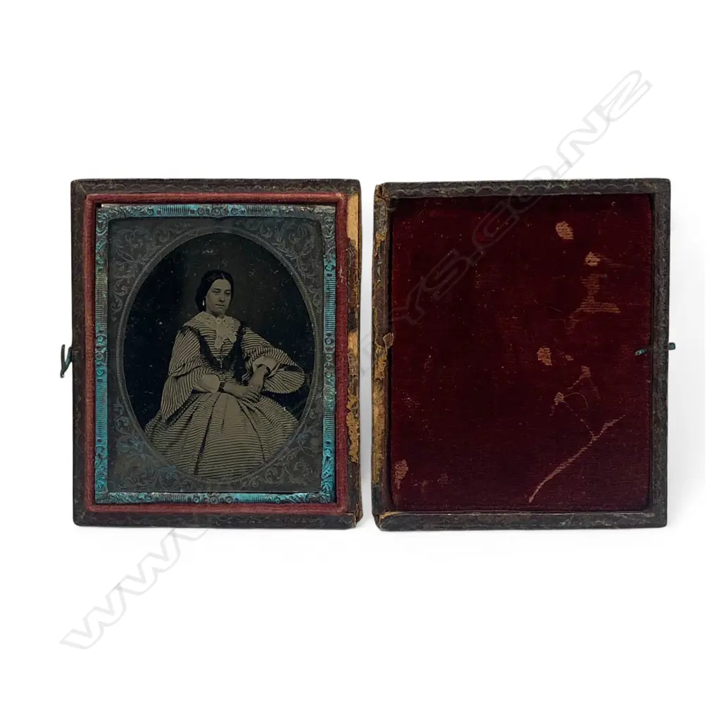 Silver framed and matted leather cased ambrotype - seated woman in striped dress, Image 1++